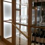 LELLO'S - RESTAURANT DESIGN | Wine store & lightbox detail | Interior Designers